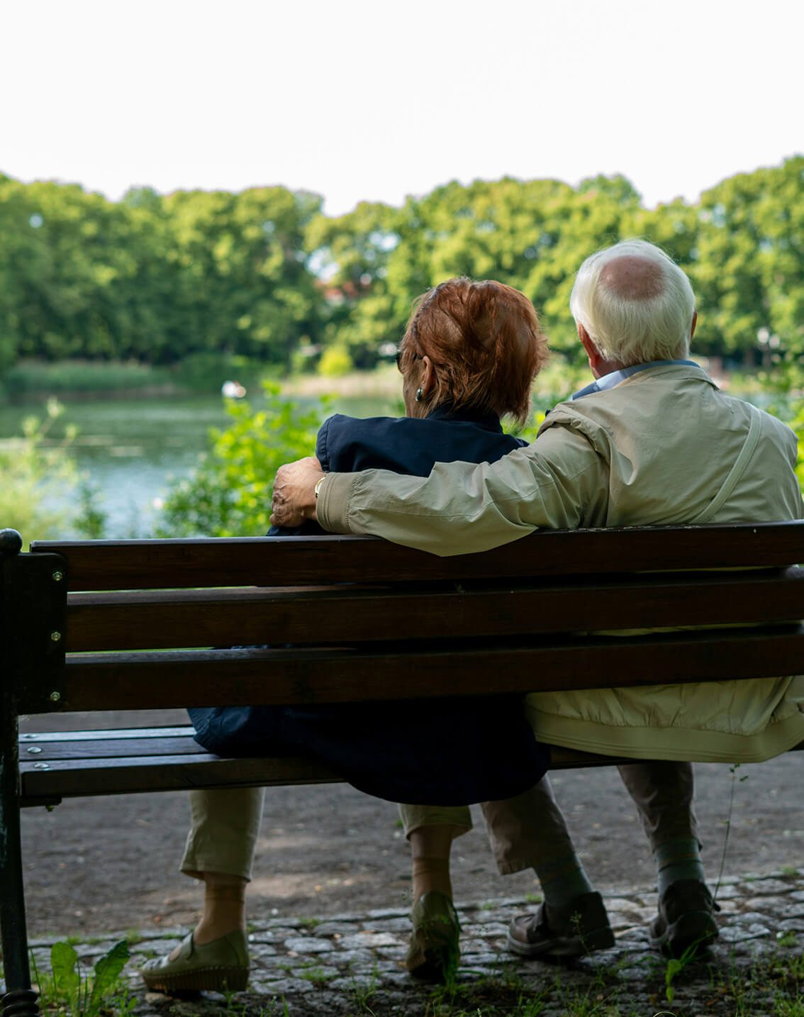 elderly couple on a bench